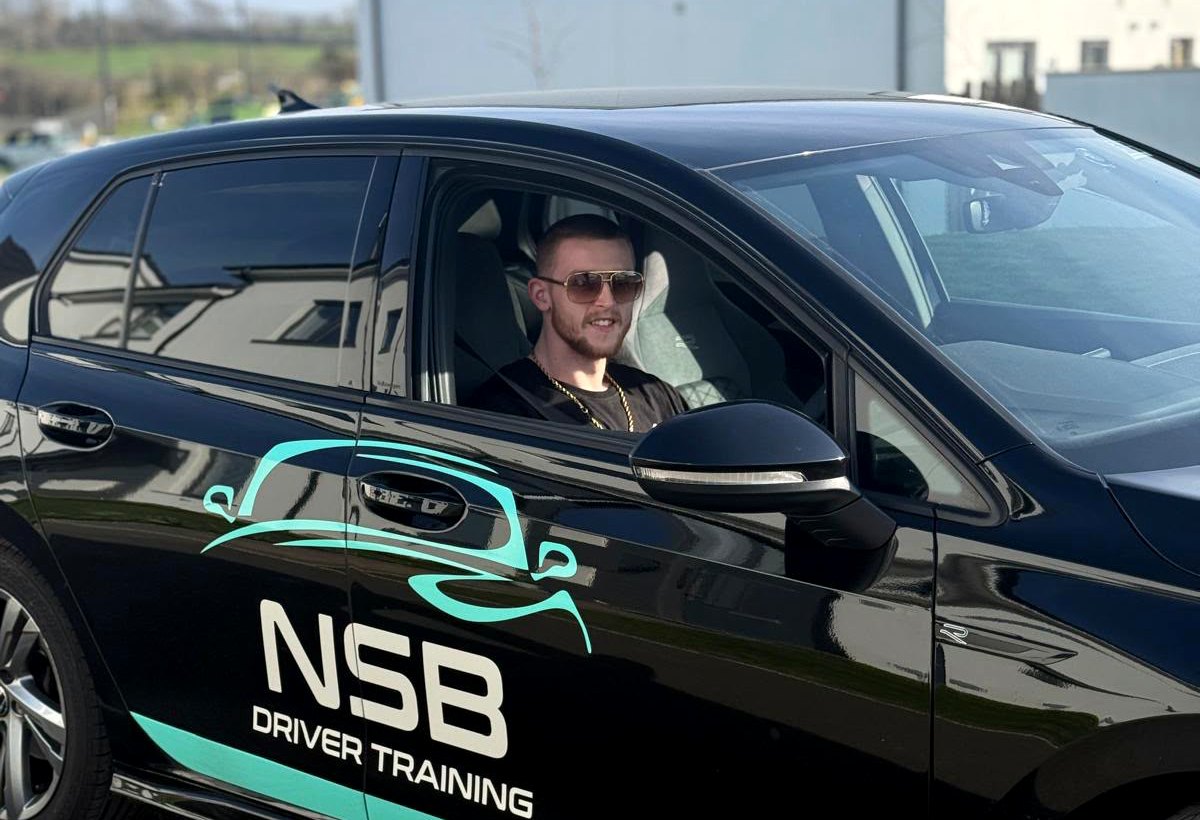 Nathan Bloore in the branded NSB Driver Training car
